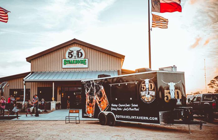 5D Travelin' Tavern is a premier mobile alcohol catering service from 5D Steakhouse, located here in the back. This food trailer bar provides you with all the necessary amenities to host a successful event.