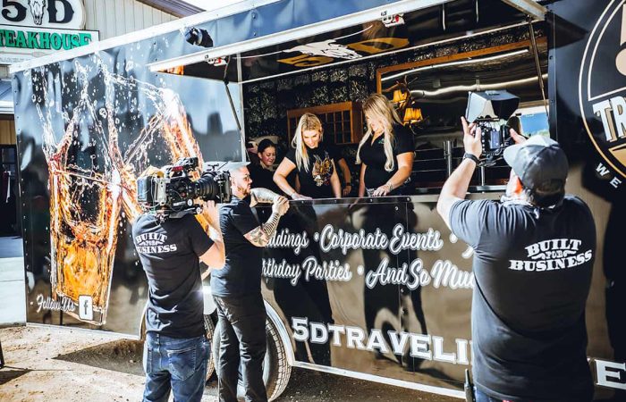 The 5D Travelin’ Tavern Food Trailer Bar is the perfect solution to cater alcohol for your next event! With a serving window for fast drink service you'll have everything you need for guests to have a great bar experience anywhere you can put a food trailer. This BTS shot for Built for Business captures the activation in front of 5D Steakhouse.