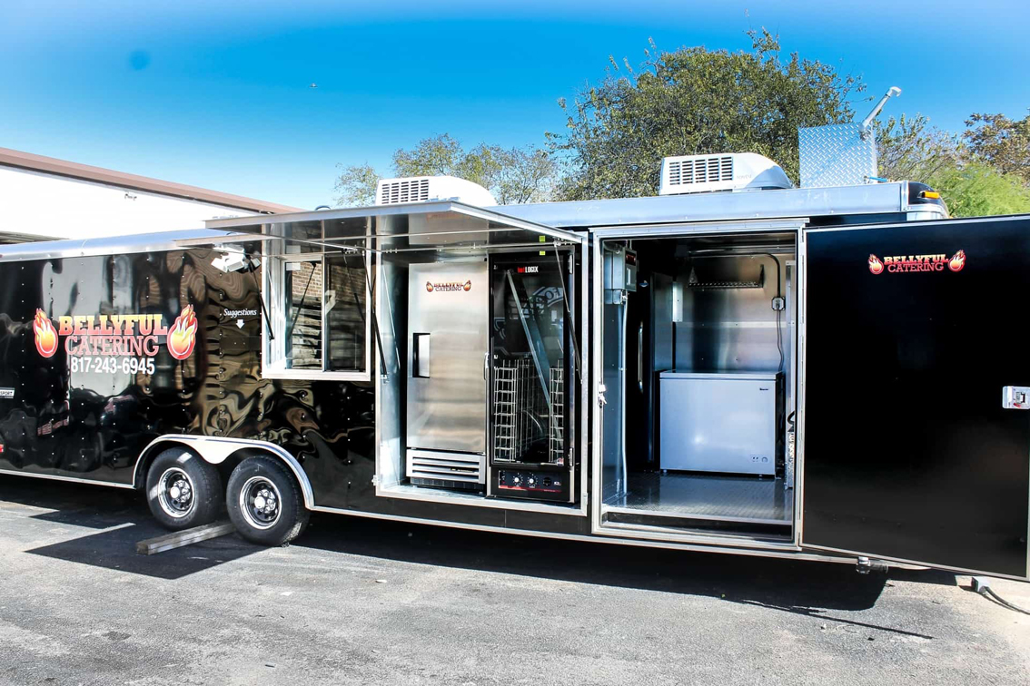 The Bellyful Catering Food Trailer is a custom built mobile kitchen with top of the line appliances, perfect for serving high volumes at any location. Contact Cruising Kitchens to customize a food trailer for your business.