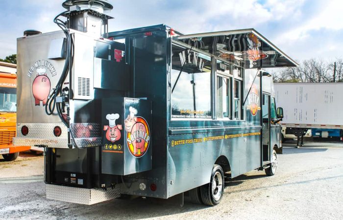 Looking for a top of the line BBQ food truck? Look no further than the Buttz BBQ Food Truck, custom built by Cruising Kitchens. With a smoker, quick warmers and top of the line friers, this truck is perfect for serving up gourmet pulled pork sandwiches.