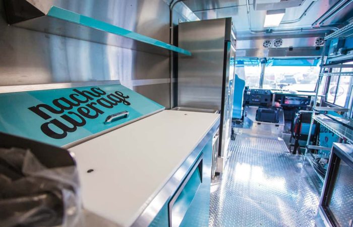 The Nacho Average Food Truck (AISD) is a custom build truck from Cruising Kitchens featuring top tier equipment. Designed in conjunction with the students who will benefit from the truck, this food truck is perfect for high volume, efficient workflow.