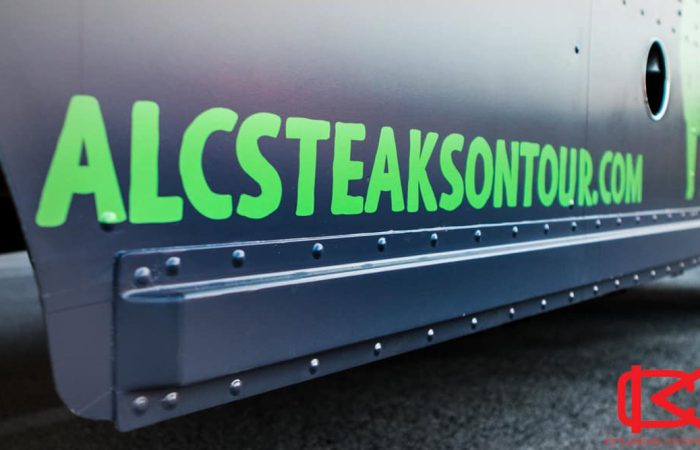 ALC Steaks On Tour Food Truck #2 is a custom built food truck offering delicious steak sandwiches, salads, and sides. This food truck is equipped with a top-of-the-line kitchen and all the necessary amenities to provide a great customer experience. Go and experience the best steak sandwiches in town! Get a food truck like this built for your entrepreneurial ambition and have less overhead with more ROI. With print graphics like this, the website is sure to bring business to your food truck.