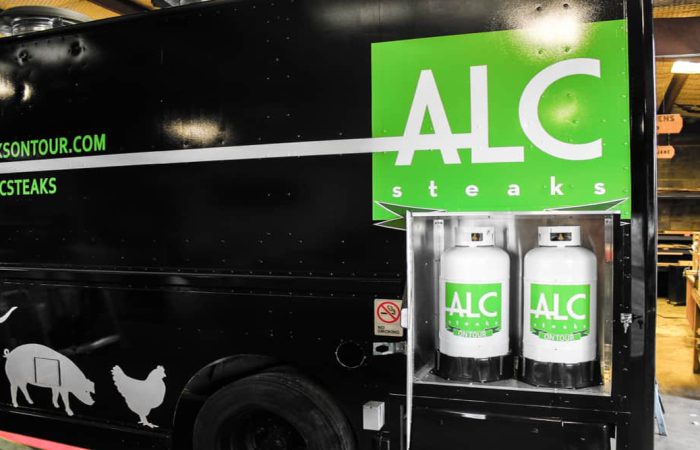 This custom-built, full kitchen food truck is the perfect way to bring your steakhouse on the road. ALC Steaks On Tour Food Truck offers a unique and delicious mobile dining experience with a variety of steak dishes, sides, and desserts. Operated on propane with an exterior compartment seamlessly wrapped to match the exterior body, this food truck burns clean fuel and leaves more space for the interior to maximize storage capacity.