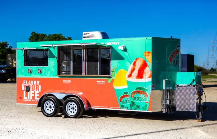 Bahama Bucks Shaved Ice Food Trailer is built by Cruising Kitchens to provide high quality shaved ice for an exceptional customer experience. With sleek diamond plating and a graphics package that screams Bahama Bucks, this trailer is the perfect place to go for a refreshing sno-cone!