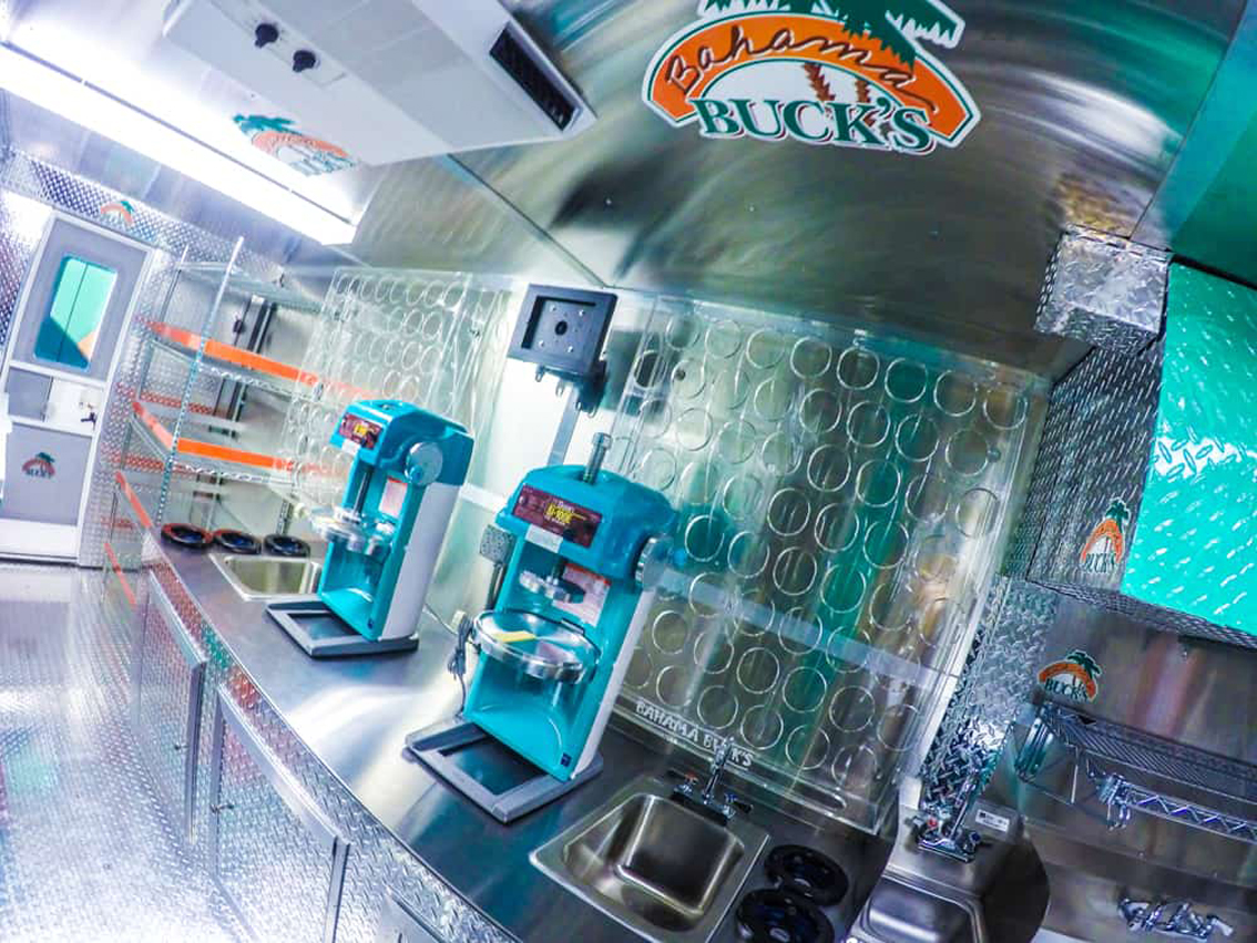 Bahama Bucks is the place to go for a refreshing sno-cone. Our custom-built food trailer from Cruising Kitchens features high-quality shaved ice and sleek graphics package.