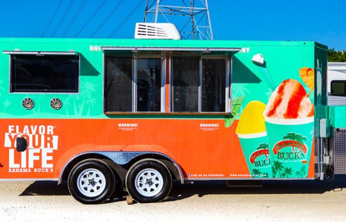 Bahama Bucks Shaved Ice Food Trailer is perfect for large events. With a sleek design and top-of-the-line features, this trailer will provide a large quantity of quality shaved ice to keep your guests high in volume, and they stay cool and refreshed.