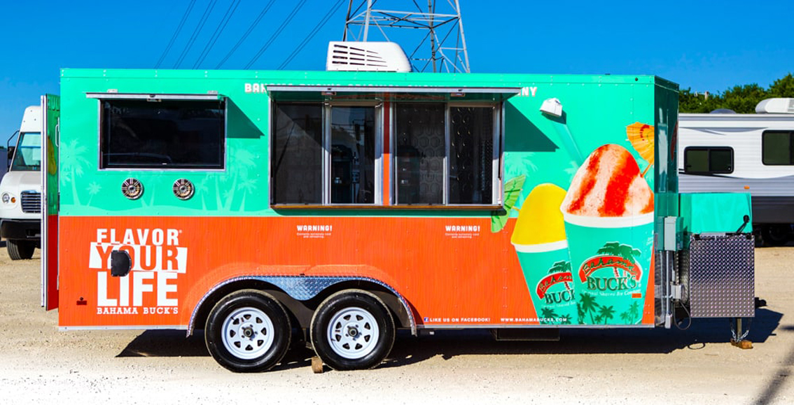 Bahama Bucks Shaved Ice Food Trailer is perfect for large events. With a sleek design and top-of-the-line features, this trailer will provide a large quantity of quality shaved ice to keep your guests high in volume, and they stay cool and refreshed.