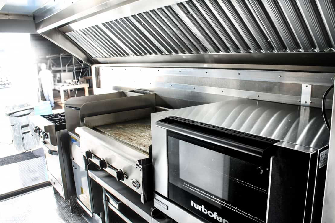 When you need a mobile kitchen that can handle high volumes, the Bellyful Catering Food Trailer is your best option. This custom-built food trailer comes with top of the line appliances and a ventilation system to keep your food fresh.