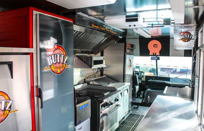 Check out the Buttz BBQ food truck, custom built by Cruising Kitchens with top of the line equipment. Specializing in gourmet pulled pork sandwiches, this simple yet efficient setup features a smoker, quick warmers, top of the line friers and more.