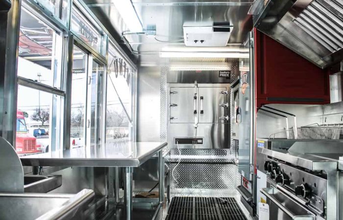 The Buttz BBQ food truck is a perfect example of how you can customize your food truck with Cruising Kitchens. With top of the line equipment, this simple yet efficient setup is perfect for gourmet pulled pork sandwiches.