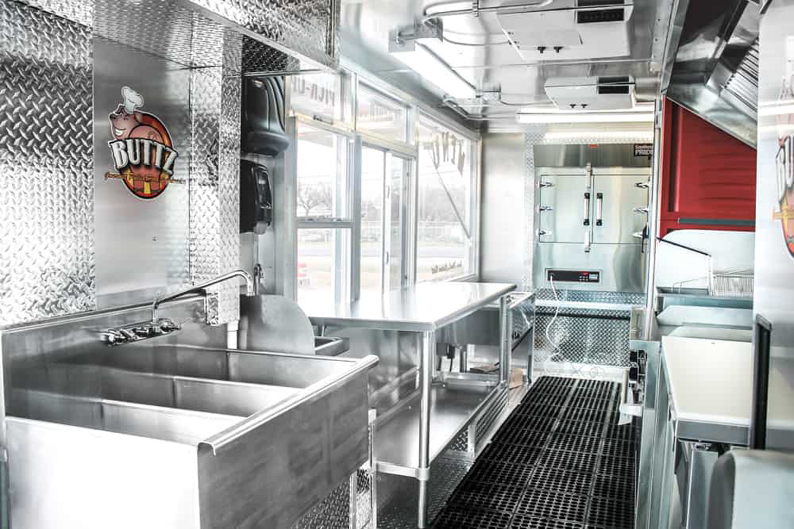Buttz BBQ Food Truck is a perfect example of how you can customize your food truck with Cruising Kitchens, while maintaining an efficient workflow setup and a quality built, brand impactful business model for a food truck.