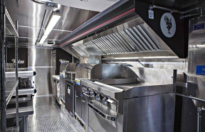 The Coop Food Truck is a custom food truck built for Zoo Atlanta by Cruising Kitchens. It was designed specifically for quality breaded chicken tenders at high volume and features a sleek interior.