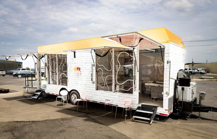 Bettys Co Mobile Health Trailer is a sleek, chic clinic on wheels that can be used for OBGYN gynecology and mental wellness activations. This mobile health trailer is unlike anything ever done.
