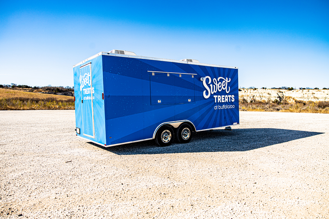 The Buffalo Zoo Sweet Treats Food Trailer is a simple and sophisticated setup for expediting the service of sweets like chocolate covered strawberries, cookies, candy and more. This affordable business model can command a larger customer base when put in the right setting.