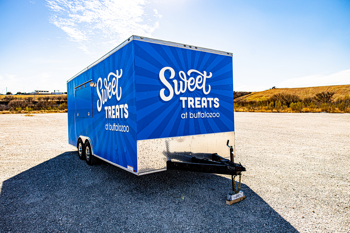 This affordable food trailer is perfect for starting your own mobile business. Featuring a sleek exterior wrap and high quality interior, this model is easy to customize to your specifications. Start developing your mobile asset today with Cruising Kitchens.
