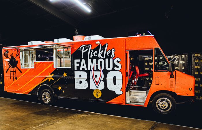 P'Lickles Famous BBQ Food Truck built by Cruising Kitchens Mobile Kitchen Food Trailer Shipping Container Kitchens Mobile Food Bank Olympic Gold Medalist Tamyra Mensah Stock